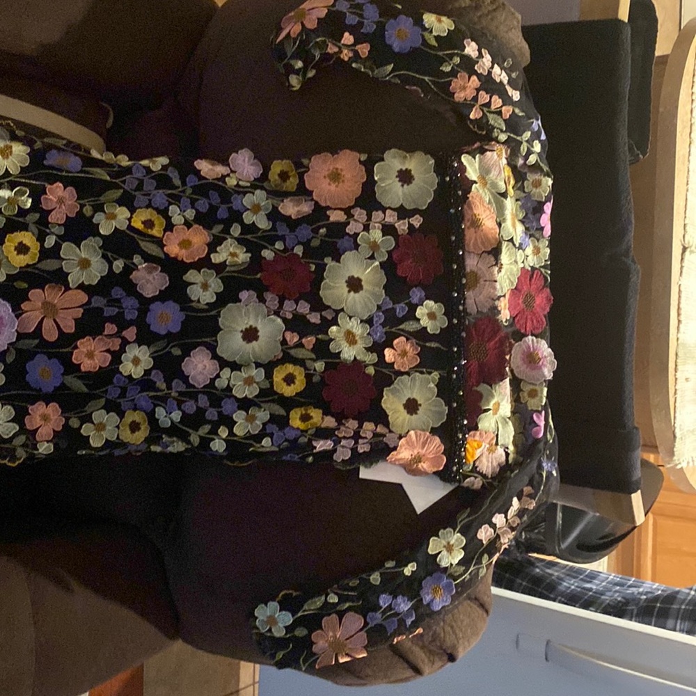 Brand new never worn McDuggal long sleeve flower dress.